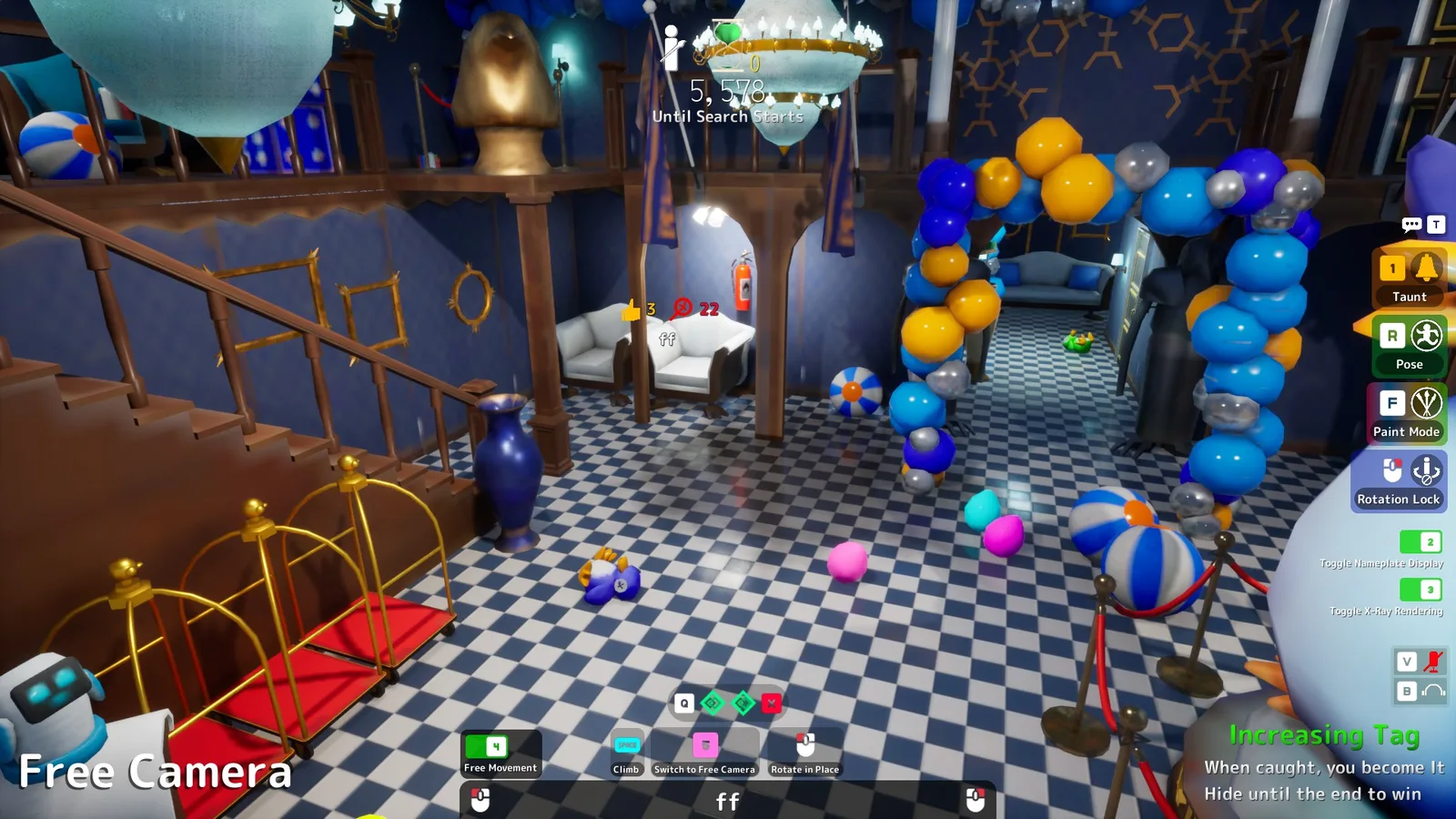 Penguin Hotel lobby: giant penguin statue, balloon arch and blue-and-gold hotel décor